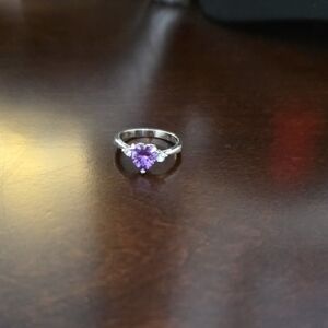 Elegant Silver Ring with Purple Gemstone